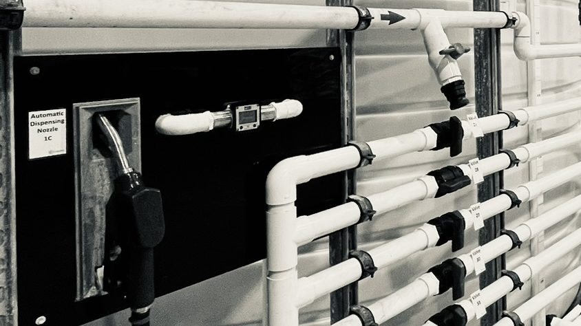 Automatic AdBlue dispensing nozzle and valve manifold