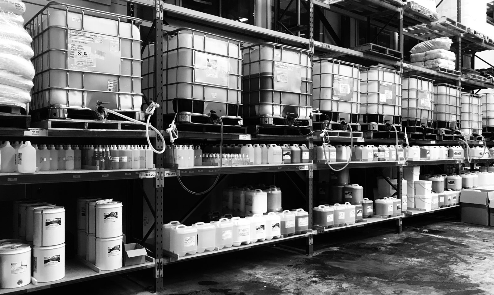 Liquidia warehouse with bulk IBCs, drums and chemical stock
